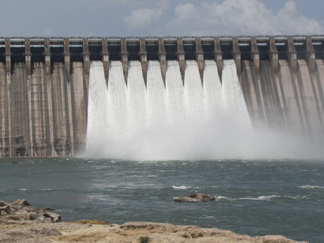 Water cascading through the open crest gates of the Nagarjuna Sagar Dam on the Krishna river