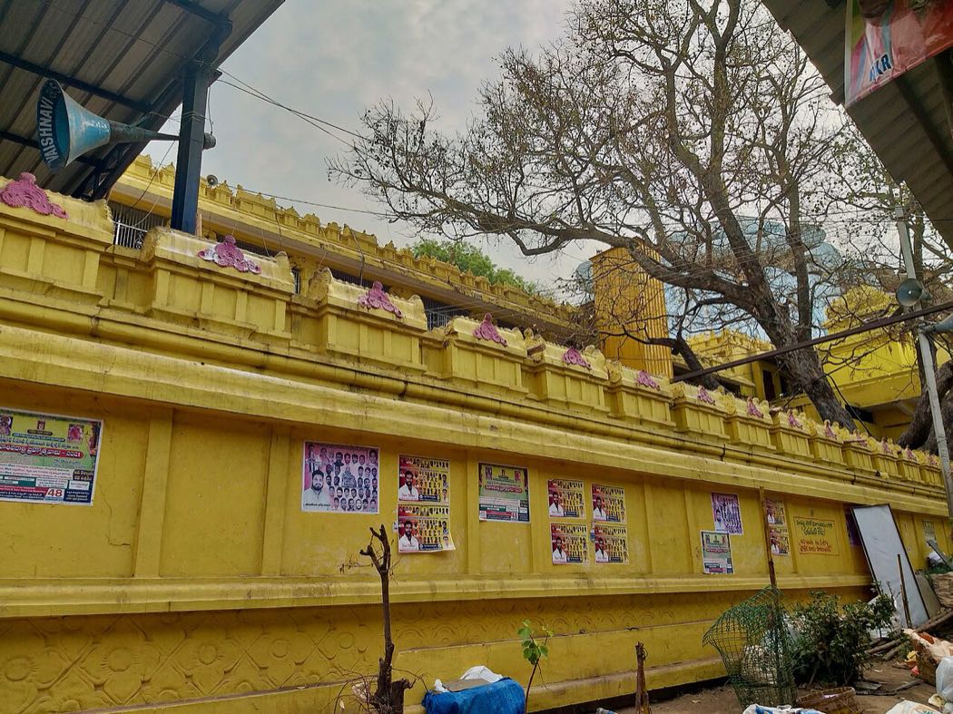 The yellow gopuram of the Komuravelli Mallanna temple, Siddipet, Telangana